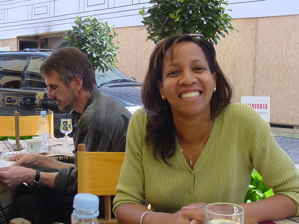Me in Lithuania with Jeremy Irons sitting behind me at a restaurant